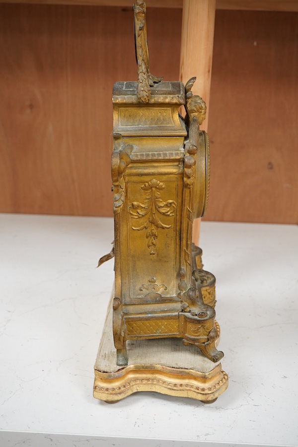 A 19th century French gilt metal mantel clock in Sevres style with gilt wood stand, 40cm total height